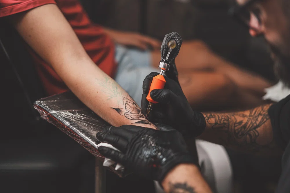 Tattooing with black ink