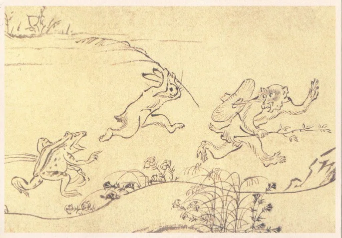 antiguo manga japonés que representa una rana persiguiendo a un conejo que a su vez persigue a un mono