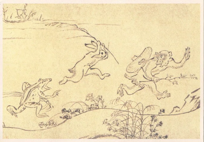 Ancien manga japonais représentant une grenouille poursuivant un lapin, qui lui-même poursuit un singe.