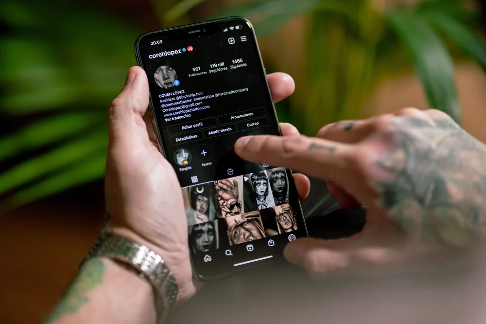 tattooist displaying his digital portfolio on Instagram