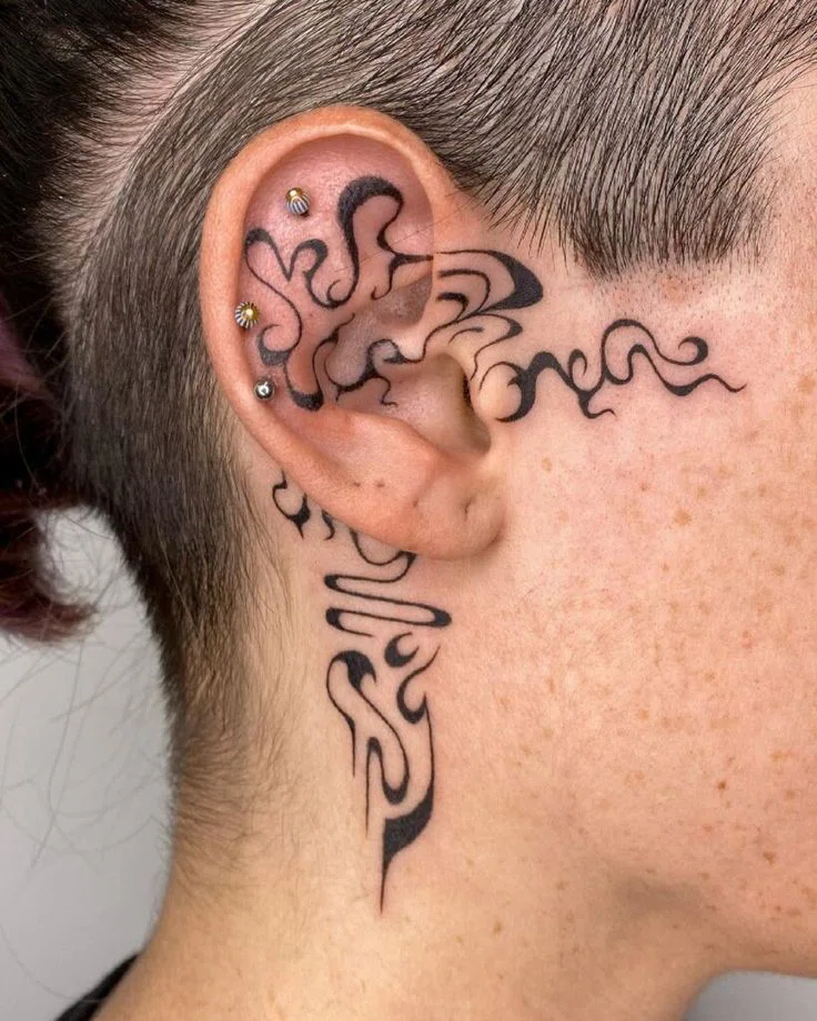Tiny Ear Tattoo | InkStyleMag