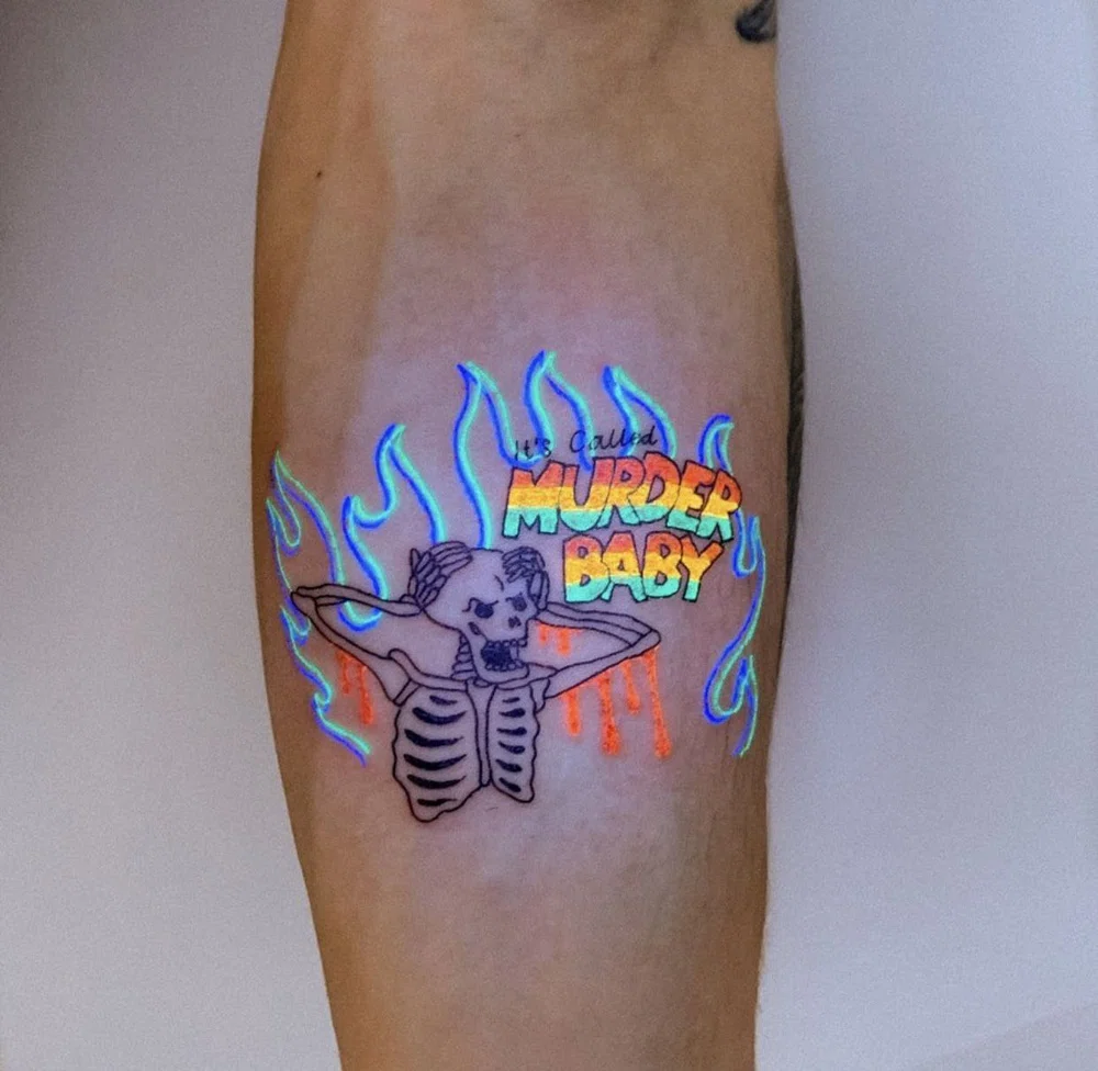 Blacklight tattoo created using ultraviolet reactive ink :  r/interestingasfuck